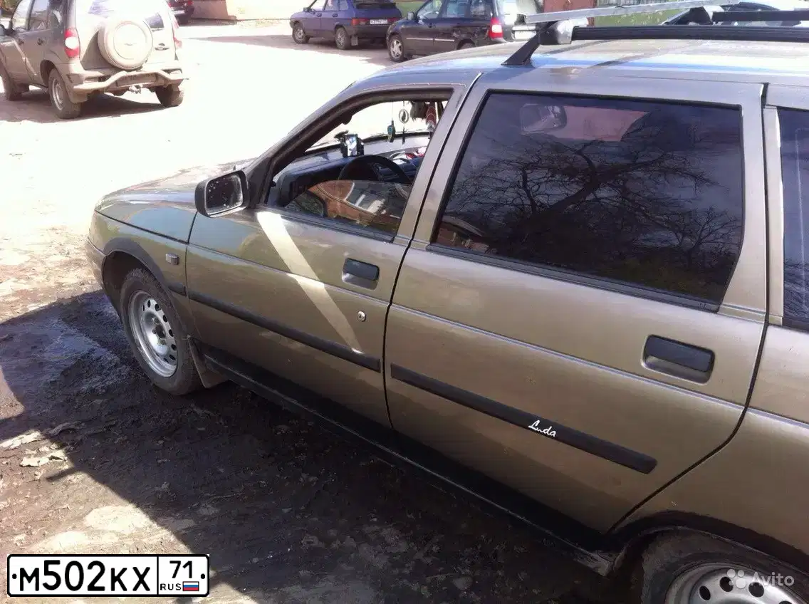 Фото автомобиля LADA 2111, 2002 — госномер М602КХ71. Цвет: СЕРО-ЗЕЛЕНЫЙ