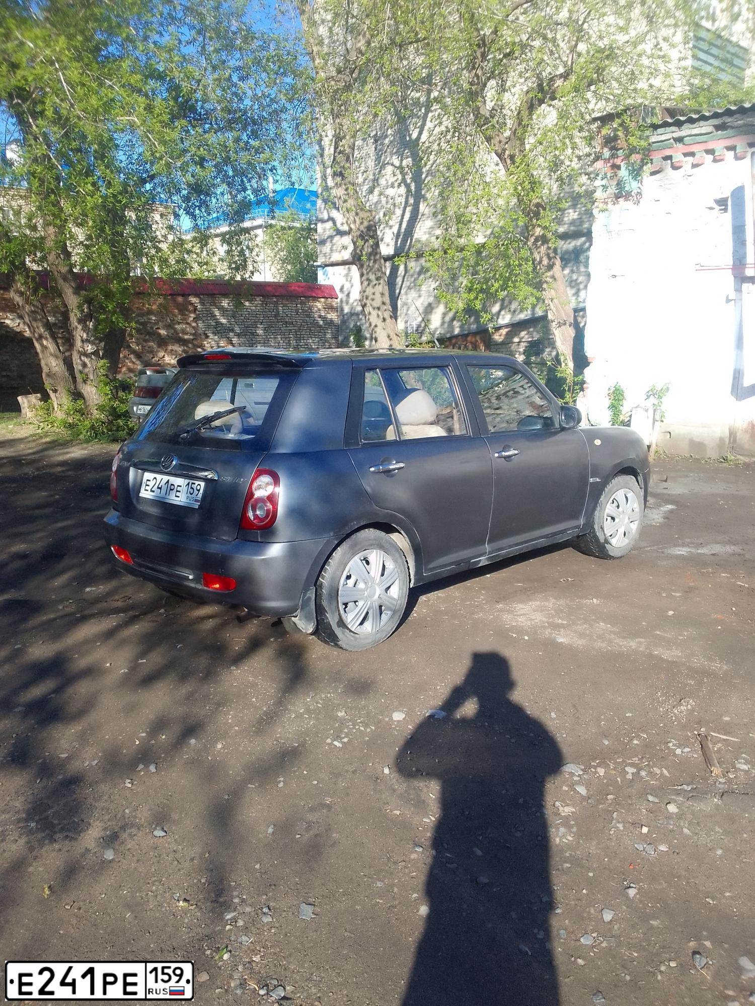 Фото автомобиля LIFAN SMILY, 2011 — госномер Е180ОО186. Цвет: СТАЛЬНОЙ