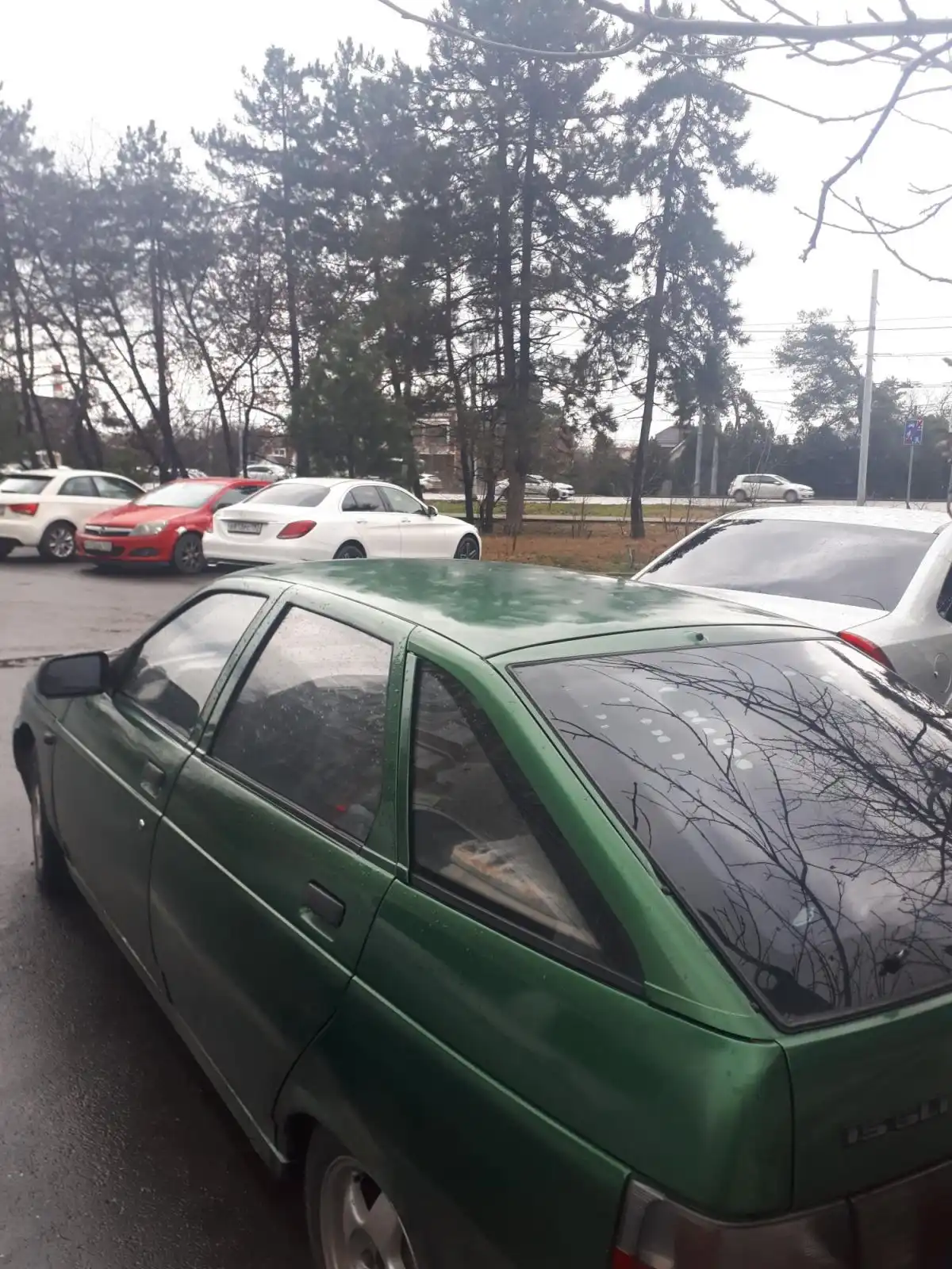 Фото автомобиля LADA 2112, 2001 — госномер Е366РТ193. Цвет: СЕРЕБРИСТЫЙ ЯРКО-ЗЕЛЕНЫЙ