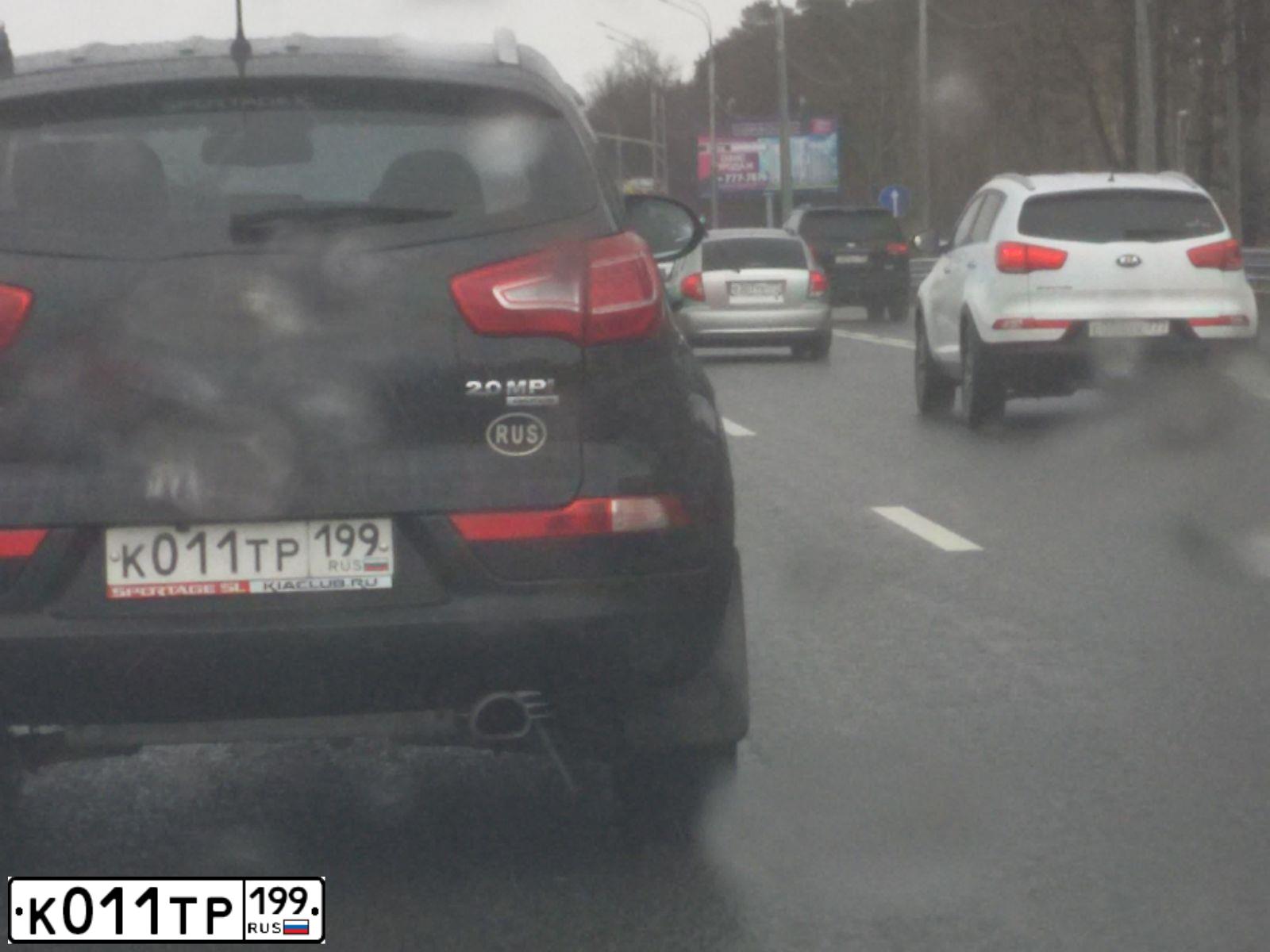 Фото автомобиля KIA SPORTAGE, 2012 — госномер К011ТР199. Цвет: ЧЕРНЫЙ ПЕРЛАМУТР