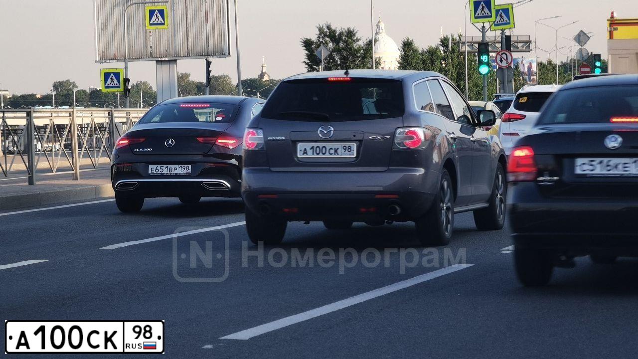 Фото автомобиля MAZDA CX-7, 2008 — госномер А100СК98. Цвет: БЕЛЫЙ
