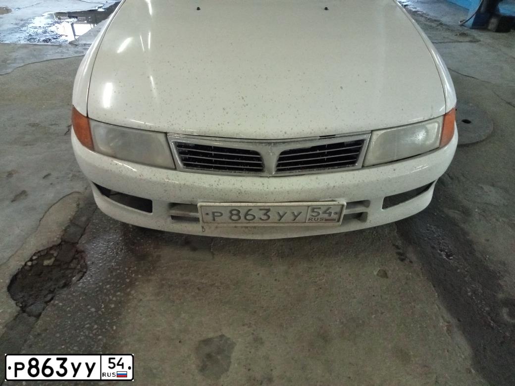 Фото автомобиля MITSUBISHI MIRAGE, 1999 — госномер С230ВА04