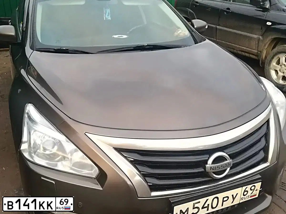 Фото автомобиля KIA SPORTAGE, 2010 — госномер В141КК69. Цвет: ЧЕРНЫЙ ПЕРЛАМУТР