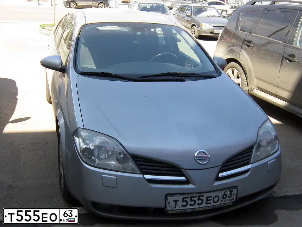 Фото автомобиля SUBARU IMPREZA, 2011 — госномер Т555ЕО63. Цвет: Красный
