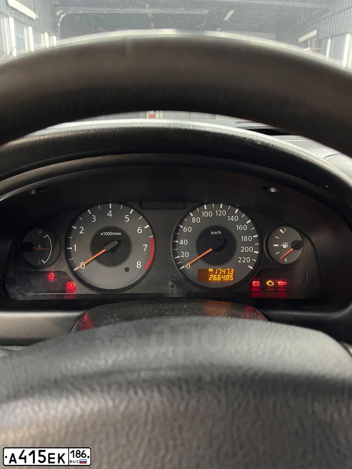 Фото автомобиля NISSAN ALMERA, 2008 — госномер Т001ТО86. Цвет: ЧЕРНЫЙ