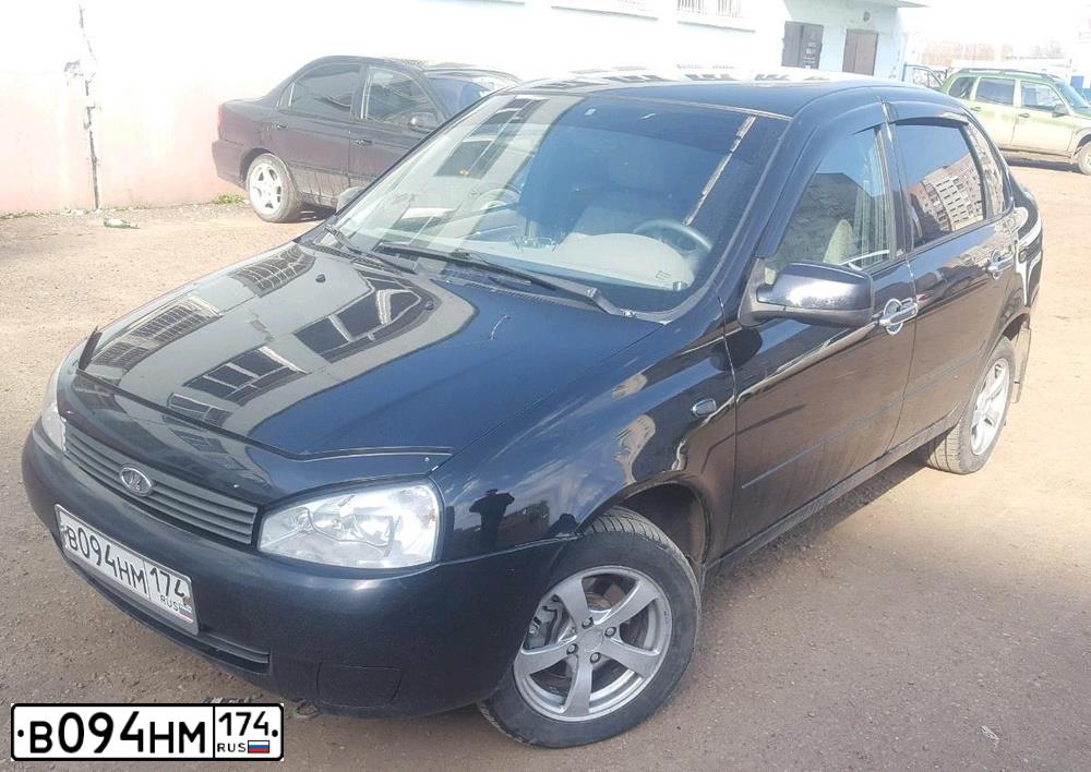 Фото автомобиля LADA KALINA, 2011 — госномер Х752ВМ774. Цвет: СИНЕ-ЧЕРНЫЙ