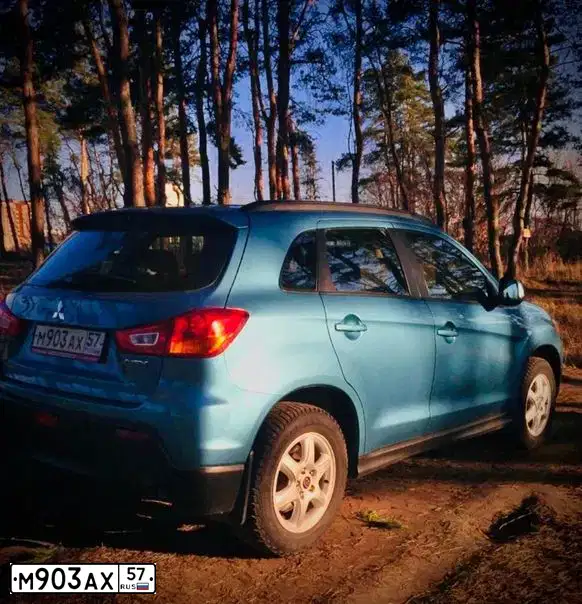 Фото автомобиля MITSUBISHI ASX, 2010 — госномер М903АХ57. Цвет: голубой