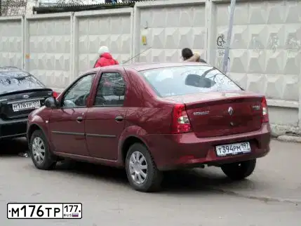 Фото автомобиля KIA CERATO, 2007 — госномер Т996МТ31. Цвет: ЧЕРНЫЙ