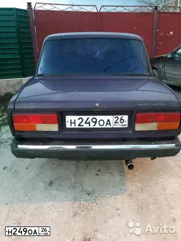 Фото автомобиля LADA 2107, 2002 — госномер Н249ОА26. Цвет: ФИОЛЕТОВЫЙ