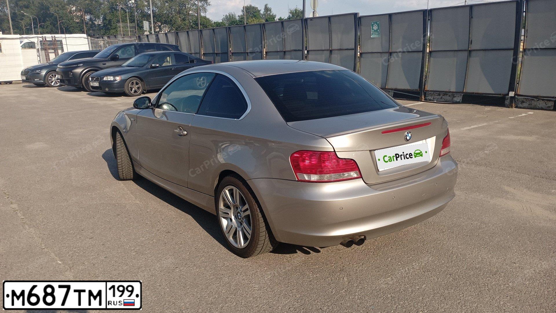 Фото автомобиля BMW SERIE 1, 2008 — госномер М687ТМ199. Цвет: СВЕТЛО-СЕРЫЙ