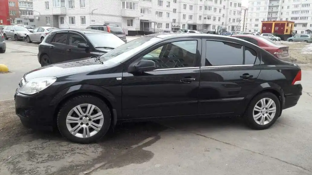 Фото автомобиля OPEL ASTRA, 2009 — госномер Е057РВ797. Цвет: ЧЕРНЫЙ