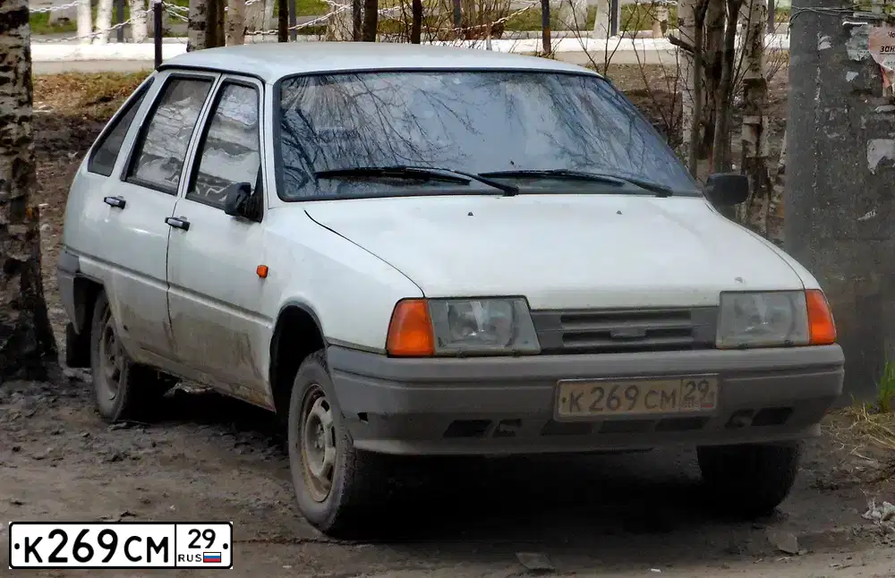 Фото автомобиля IZH 2126, 2000 — госномер К269СМ29. Цвет: СЕРО-БЕЛЫЙ