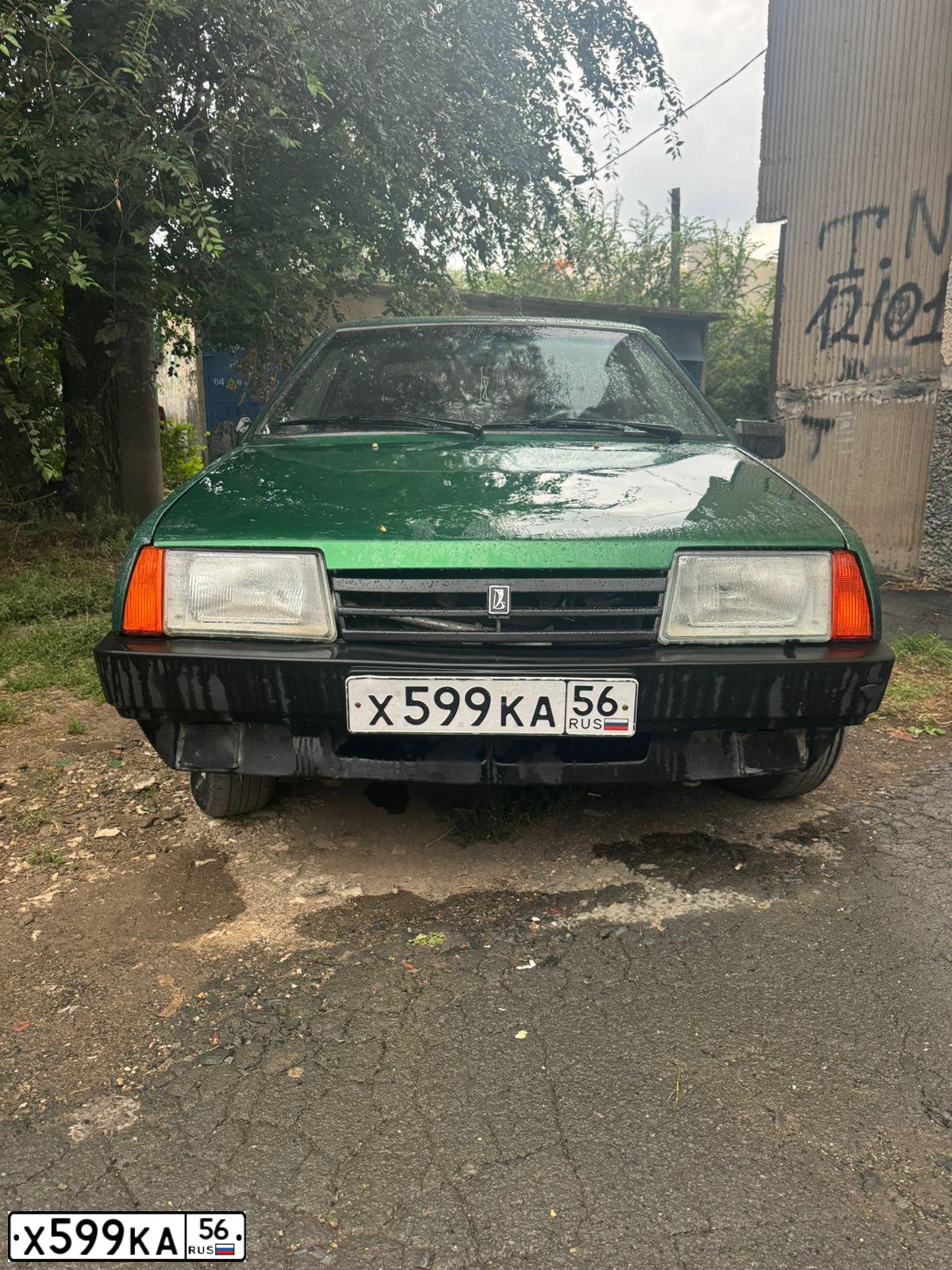Фото автомобиля LADA 2109 SAMARA, 2004 — госномер К212ЕО156. Цвет: ЗОЛОТИСТЫЙ ТЕМНО-ЗЕЛЕНЫЙ