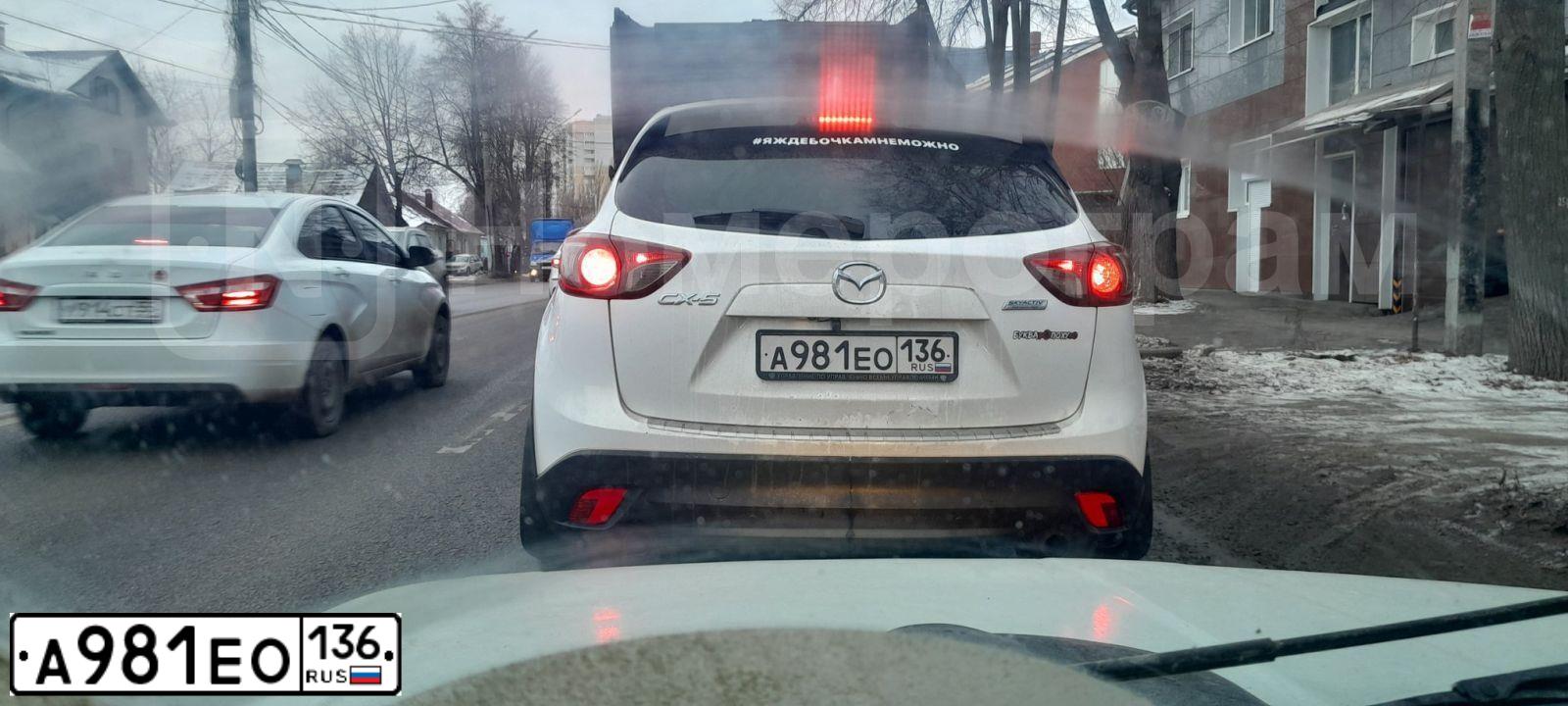 Фото автомобиля MAZDA CX-5, 2012 — госномер М392НУ14. Цвет: Белый