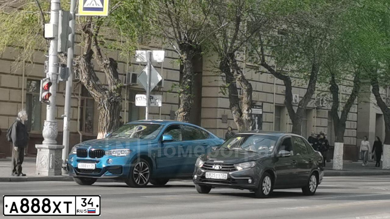 Фото автомобиля BMW X6, 2018 — госномер Н894ВТ134. Цвет: ГОЛУБОЙ