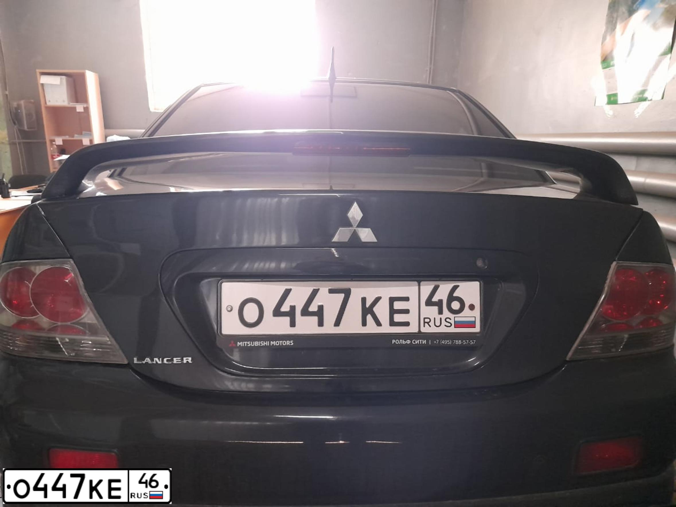 Фото автомобиля MITSUBISHI LANCER, 2006 — госномер С209ЕК46. Цвет: ЧЕРНЫЙ