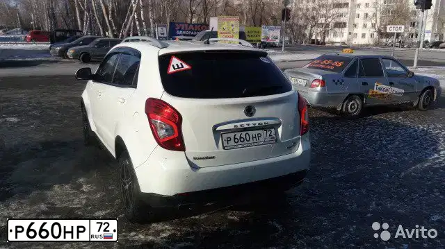 Фото автомобиля SSANGYONG ACTYON, 2014 — госномер Р166АА196. Цвет: Белый