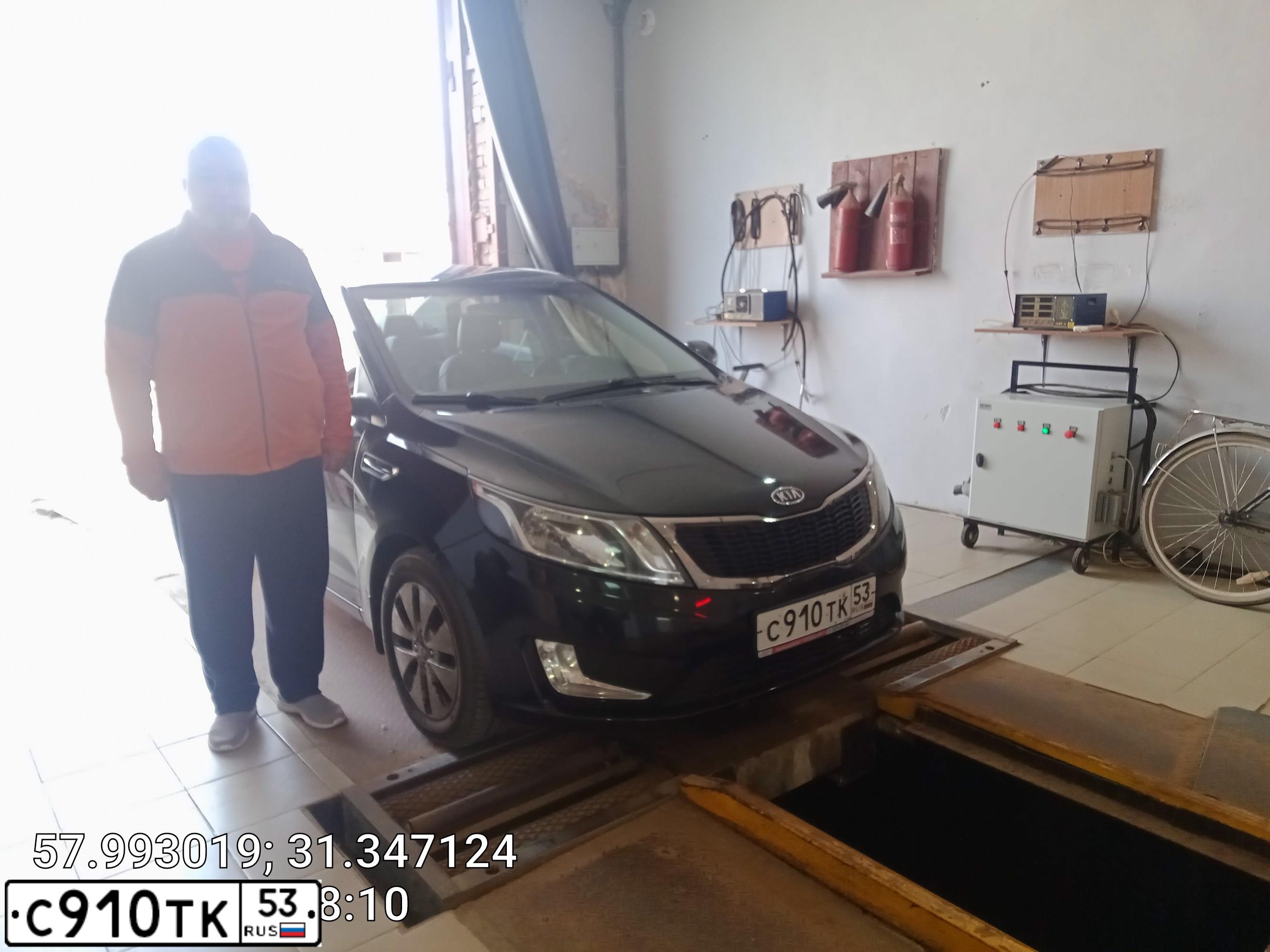 Фото автомобиля KIA RIO, 2012 — госномер С910ТК53. Цвет: ЧЕРНЫЙ