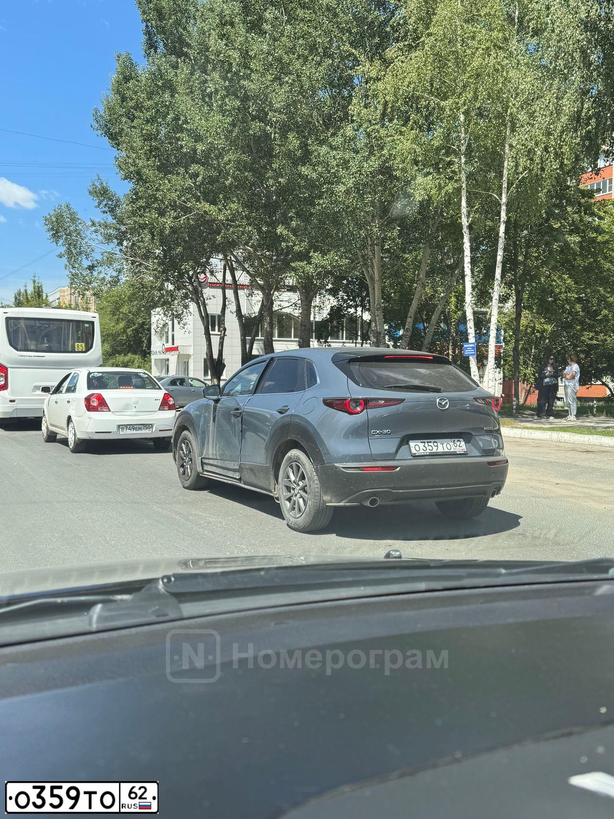 Фото автомобиля MAZDA CX-30, 2020 — госномер О359ТО62. Цвет: СЕРЫЙ