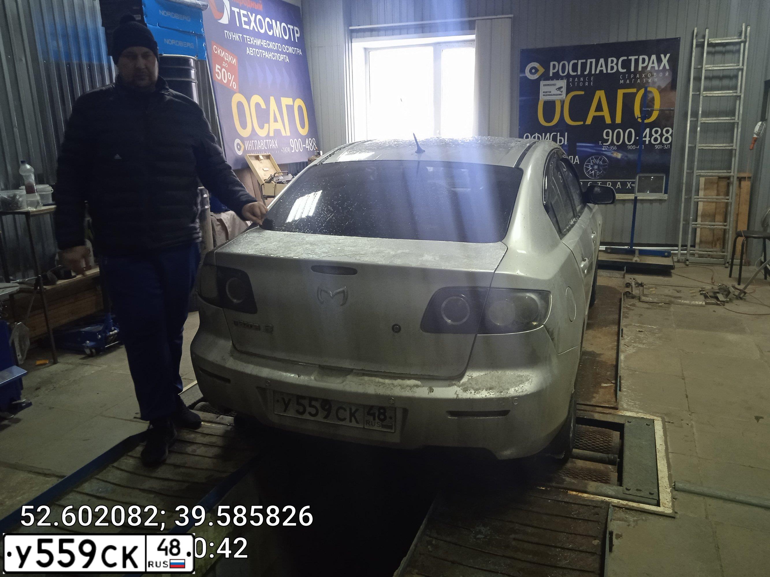 Фото автомобиля MAZDA 3, 2006 — госномер Т020МВ58. Цвет: Серебристый