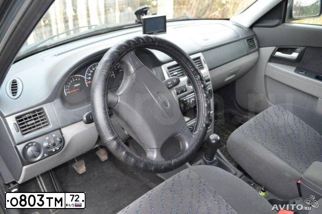 Фото автомобиля LADA 2172 PRIORA, 2010 — госномер О803ТМ72. Цвет: Серо-сине-зеленый
