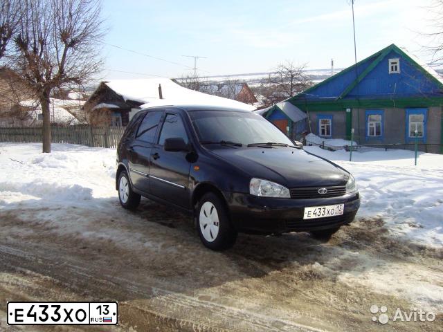 Фото автомобиля LADA 1117 KALINA, 2011 — госномер Е433ХО13. Цвет: СИНЕ-ЧЕРНЫЙ