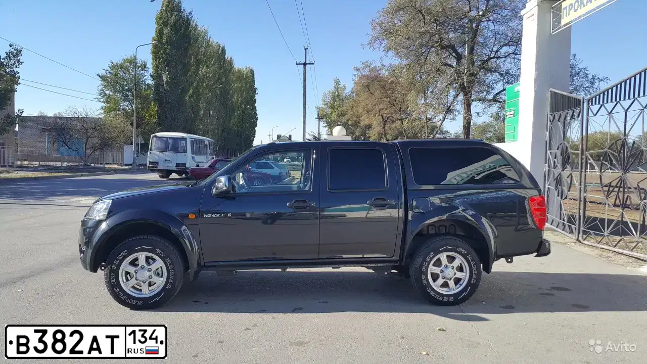 Фото автомобиля DAEWOO GENTRA, 2014 — госномер М528МУ134. Цвет: ЯРКО-КРАСНЫЙ
