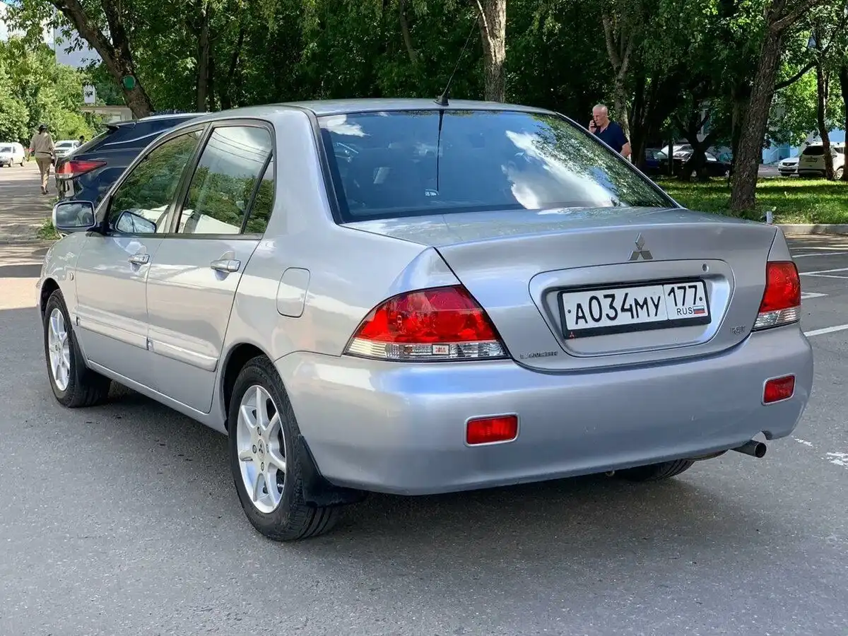 Фото автомобиля MITSUBISHI LANCER, 2006 — госномер Р660МТ82. Цвет: СЕРЕБРИСТЫЙ
