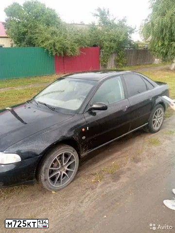 Фото автомобиля AUDI A4, 1996 — госномер М725КТ134. Цвет: ЧЕРНЫЙ
