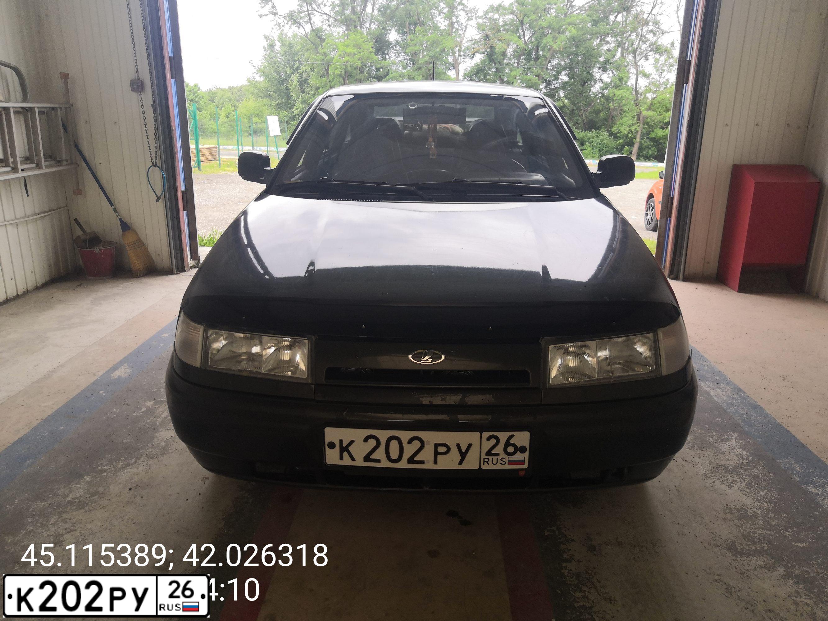 Фото автомобиля LADA 2112, 2005 — госномер К202РУ26. Цвет: ЗОЛОТИСТЫЙ ТЕМНО-ЗЕЛЕНЫЙ
