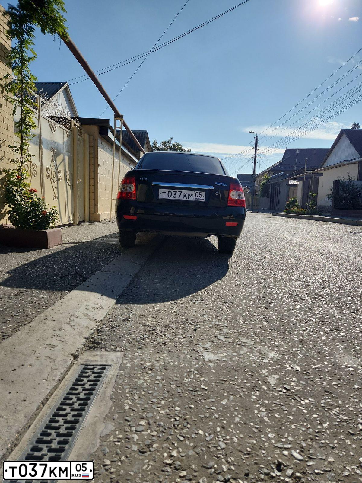 Фото автомобиля LADA 2170 PRIORA, 2009 — госномер Т037КМ05. Цвет: Сине-Черный