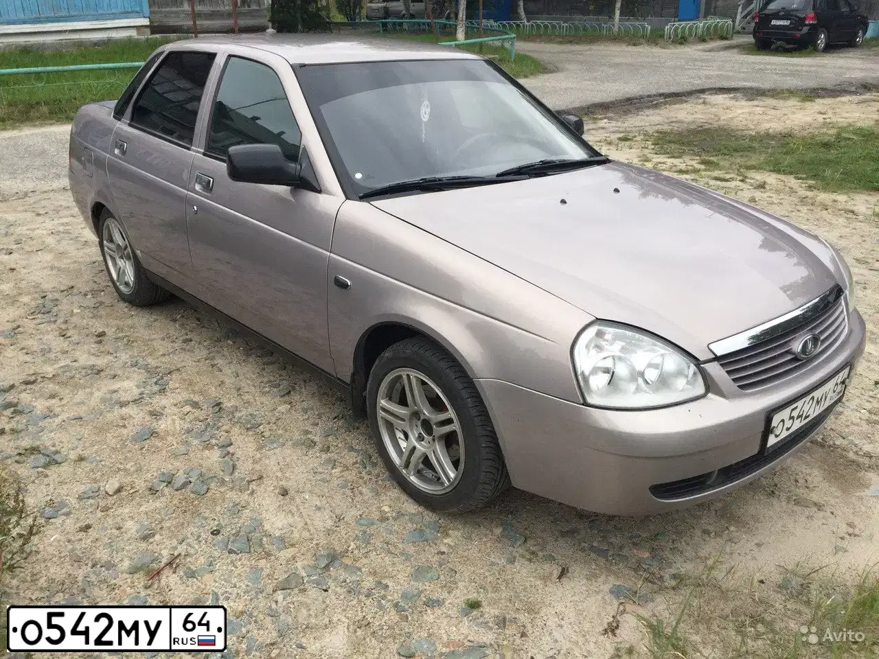 Фото автомобиля LADA PRIORA, 2007 — госномер Е667НР186. Цвет: БЕЖЕВО-СИРЕНЕВЫЙ