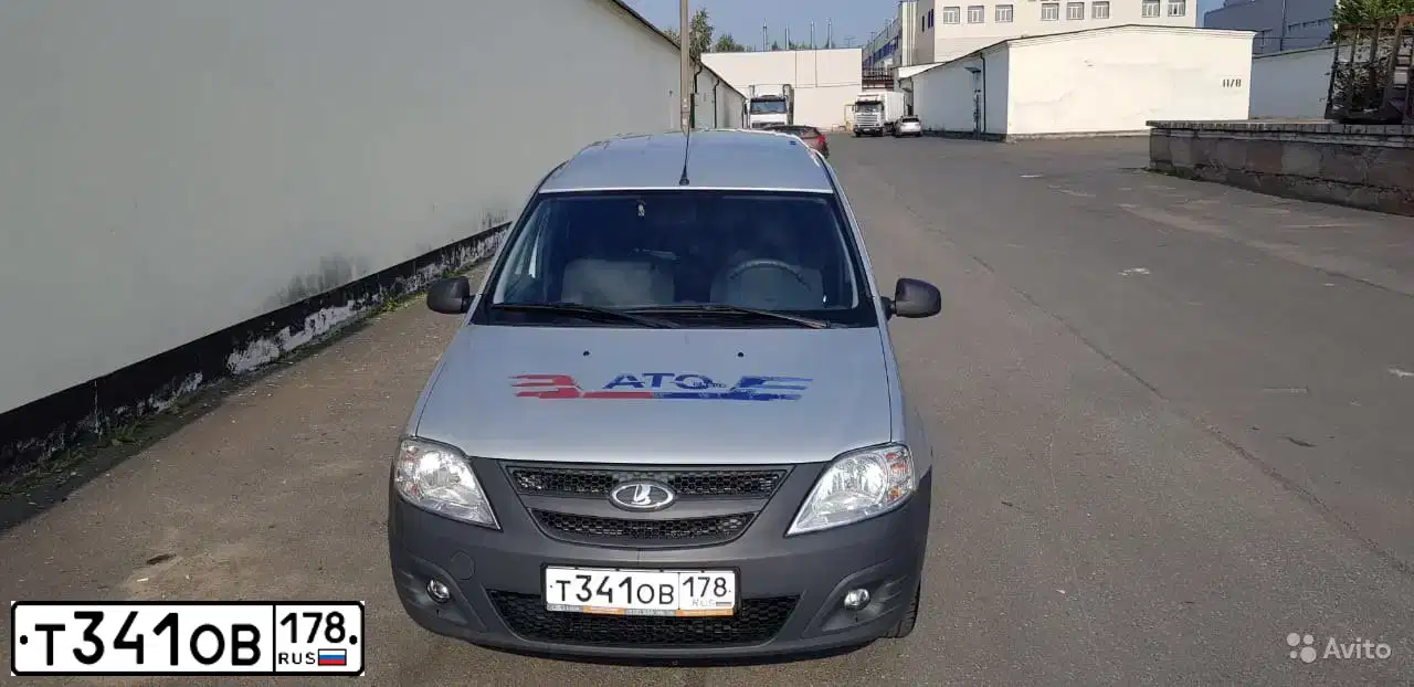 Фото автомобиля LADA LARGUS FURGON, 2015 — госномер Т341ОВ178. Цвет: СЕРЕБРИСТЫЙ