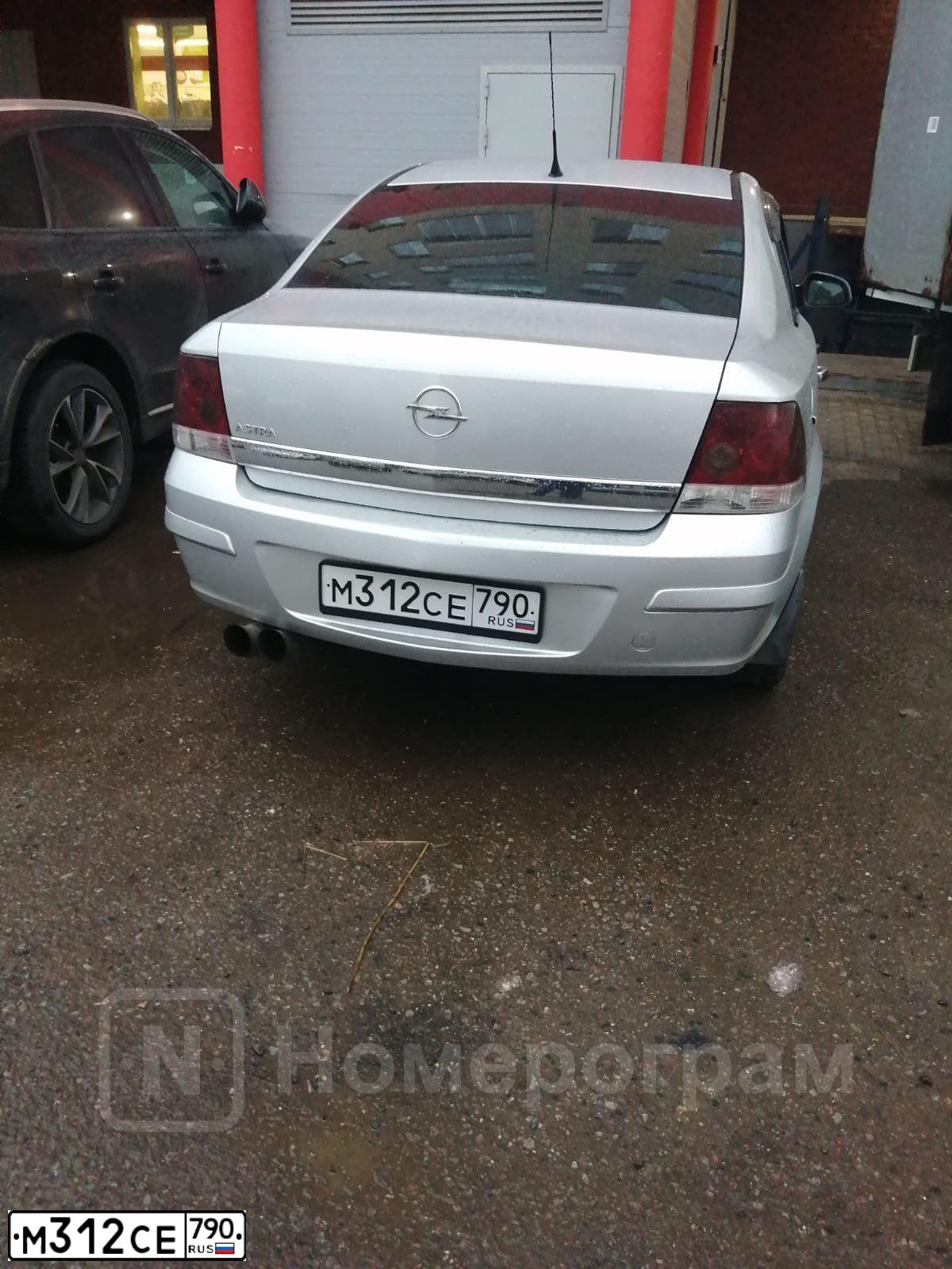 Фото автомобиля ОПЕЛЬ ASTRA (A-H/NB), 2011 — госномер М312СЕ790. Цвет: СЕРЕБРИСТЫЙ