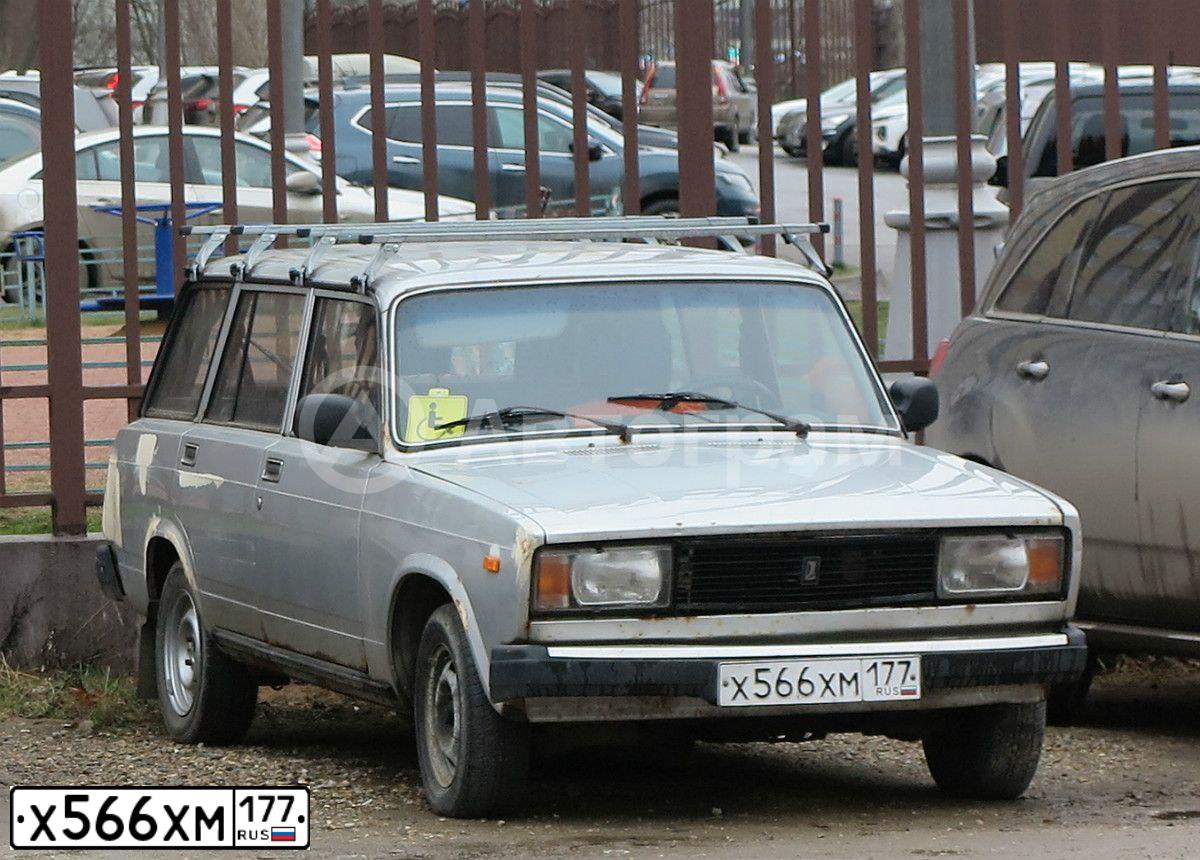 Фото автомобиля LADA 2104, 2007 — госномер О773ТХ154. Цвет: СЕРЫЙ