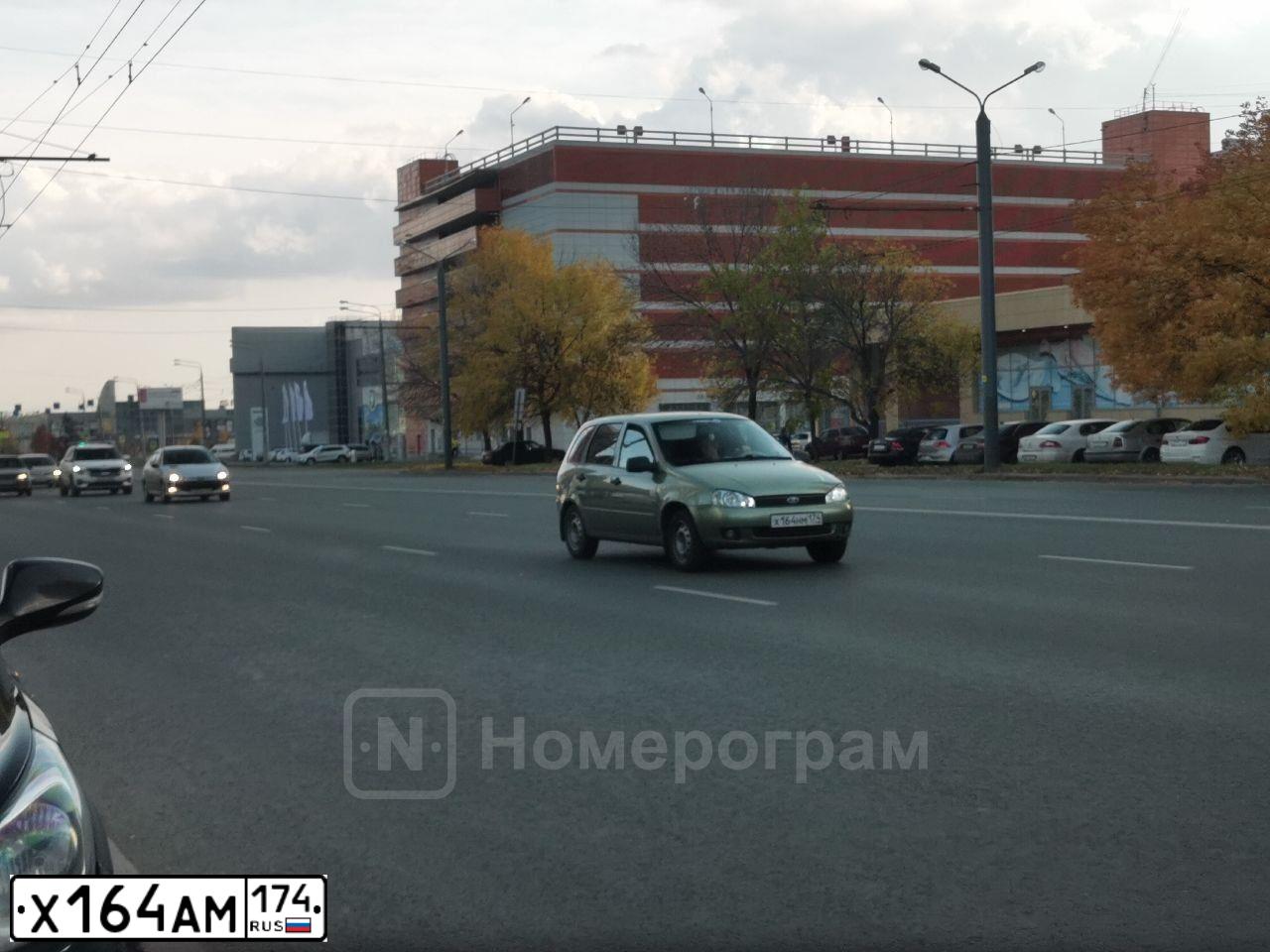 Фото автомобиля NISSAN NOTE, 2007 — госномер Х164АМ174