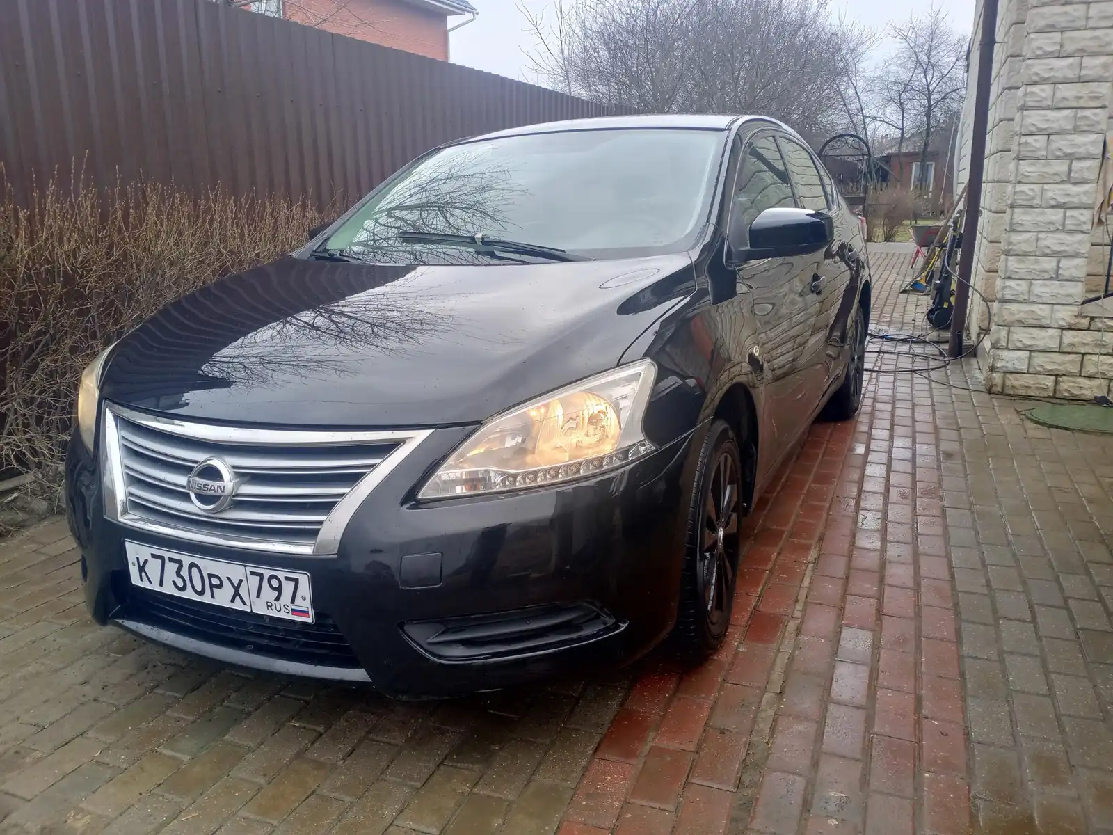 Фото автомобиля NISSAN SENTRA/LUCINO/, 2015 — госномер К730РХ797. Цвет: ЧЕРНЫЙ