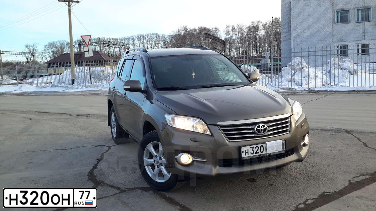 Фото автомобиля LADA 2105, 1996 — госномер Н320ОН77. Цвет: Красный