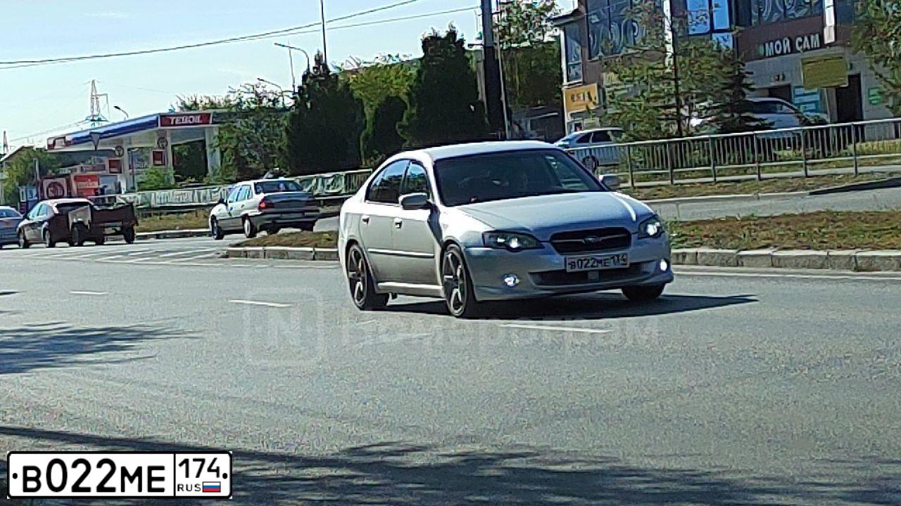 Фото автомобиля LADA 2110, 2005 — госномер Р123ВР774. Цвет: СИНЕ-ЗЕЛЕНЫЙ