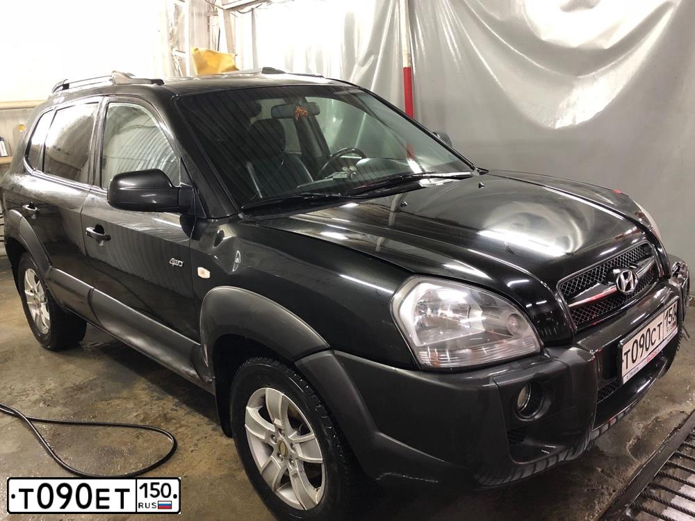 Фото автомобиля VOLVO C30, 2007 — госномер Т090ЕТ150. Цвет: ЧЕРНЫЙ