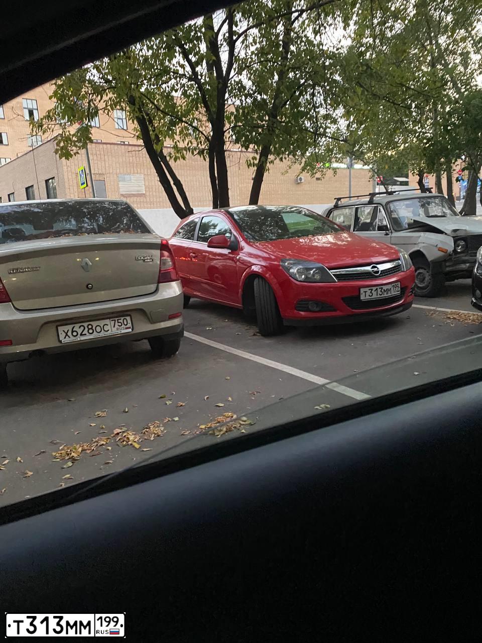 Фото автомобиля OPEL ASTRA, 2010 — госномер Т313ММ199. Цвет: КРАСНЫЙ