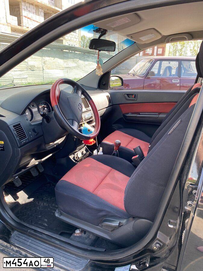Фото автомобиля HYUNDAI GETZ, 2006 — госномер М454АО48. Цвет: ЧЕРНЫЙ