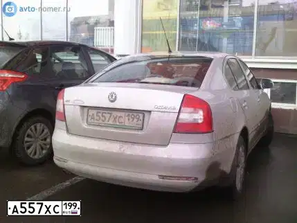 Фото автомобиля SKODA OCTAVIA, 2010 — госномер А933НА252. Цвет: Серый
