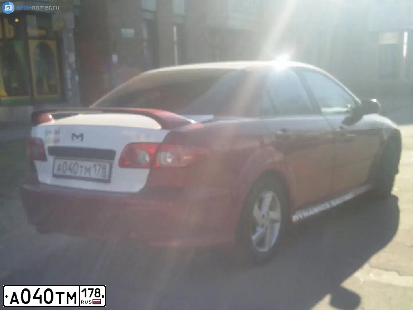 Фото автомобиля MAZDA 6, 2003 — госномер Т128МЕ178. Цвет: Красный