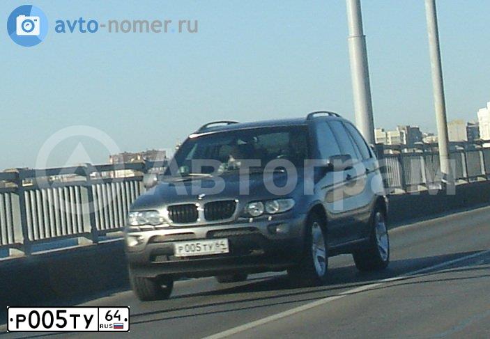 Фото автомобиля BMW X6, 2018 — госномер Р005ТУ64. Цвет: Коричневый