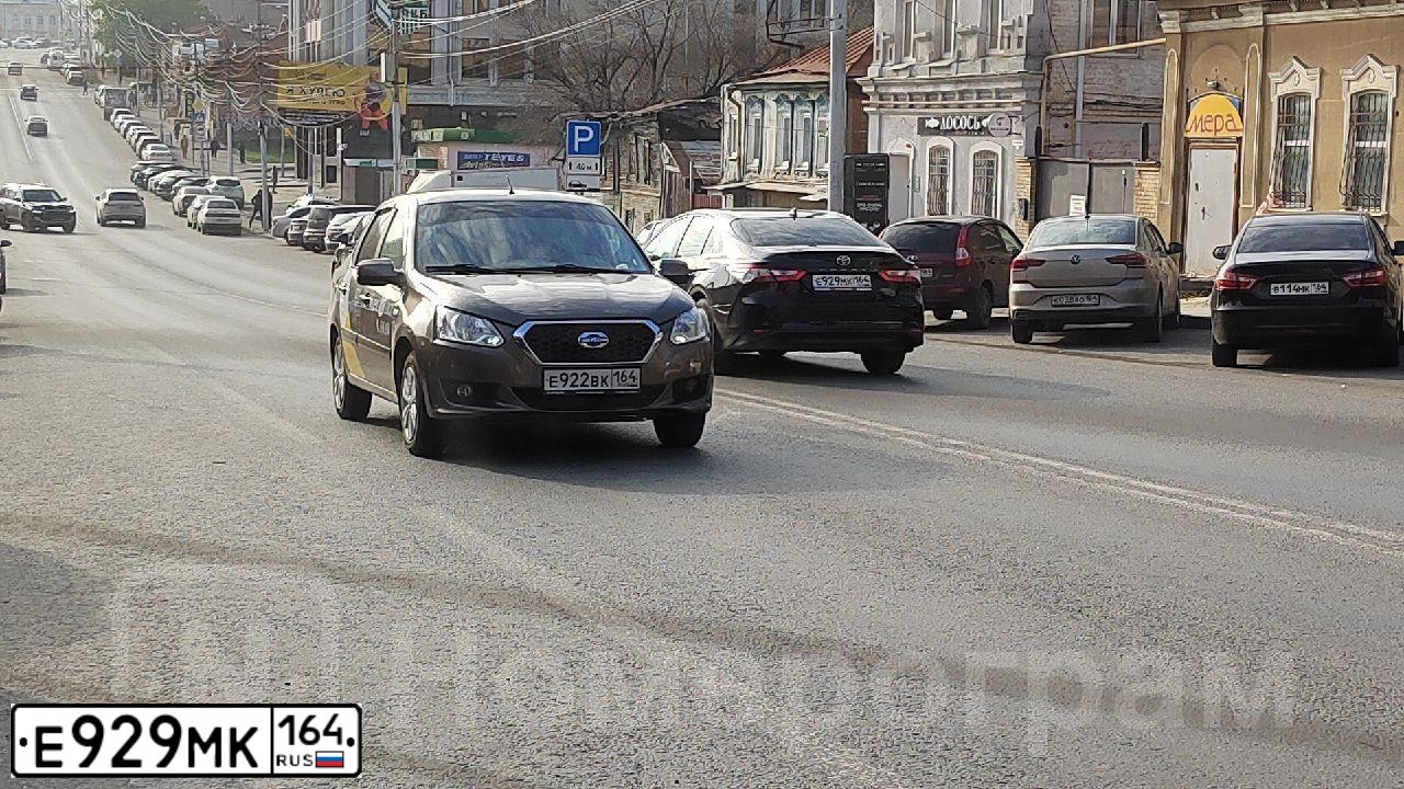 Фото автомобиля TOYOTA CAMRY, 2021 — госномер Е929МК164. Цвет: ЧЕРНЫЙ
