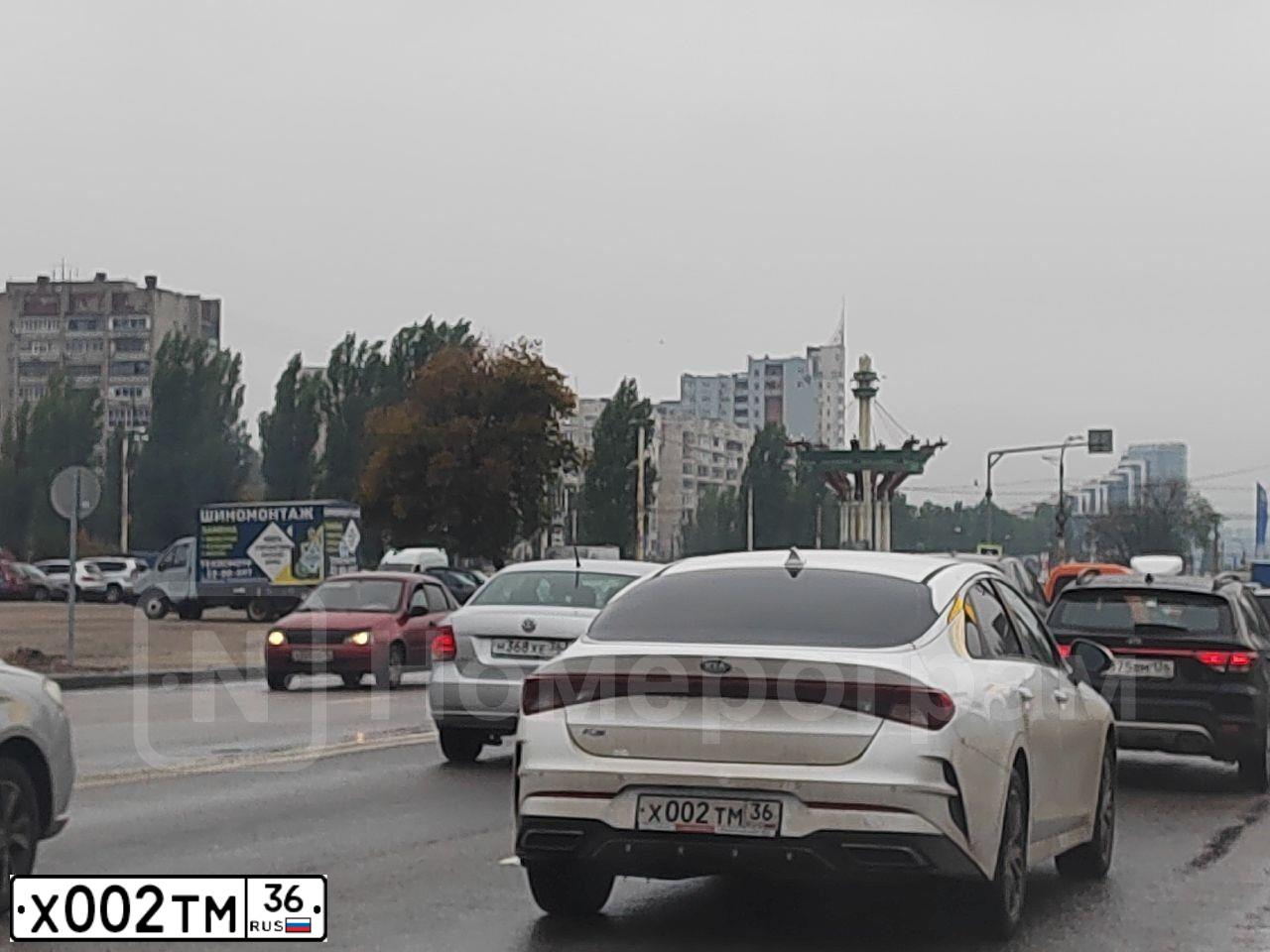 Фото автомобиля KIA MAGENTIS / OPTIMA, 2018 — госномер Х002ТМ36. Цвет: синий