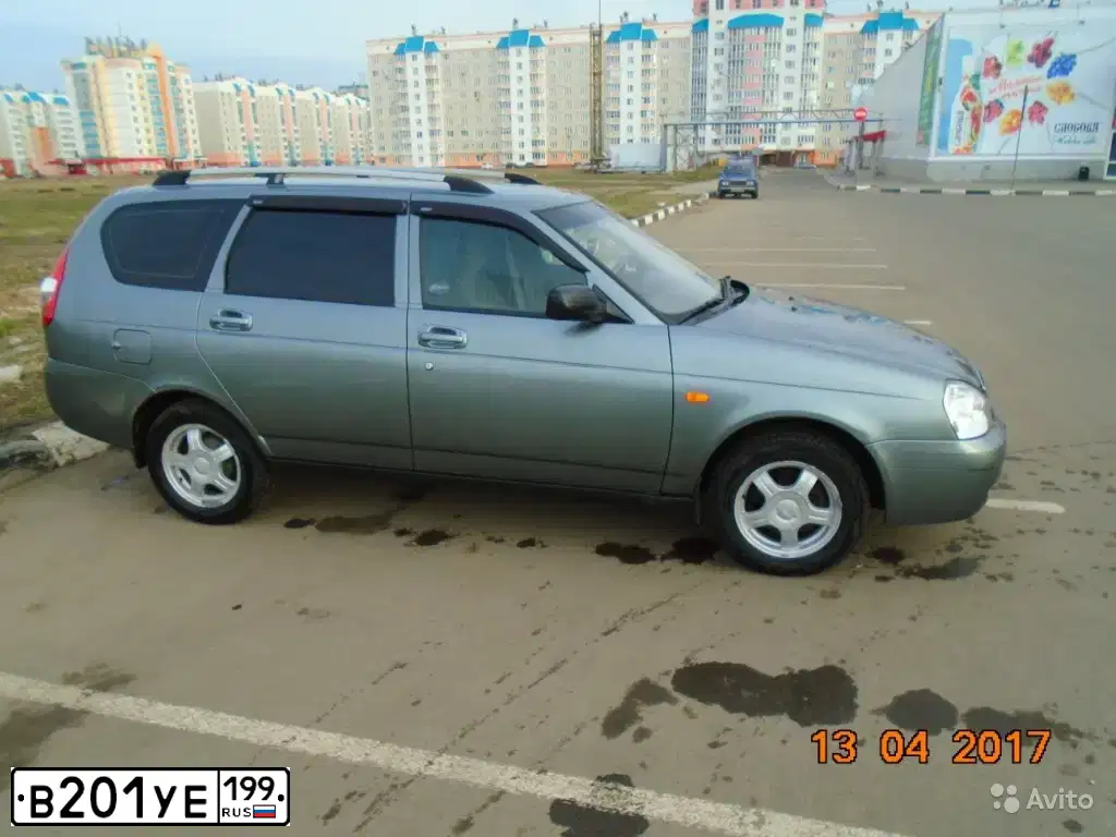 Фото автомобиля LADA 2171 PRIORA, 2010 — госномер Р246НР46. Цвет: СРЕДНИЙ СЕРО-ЗЕЛЕНЫЙ МЕТ.