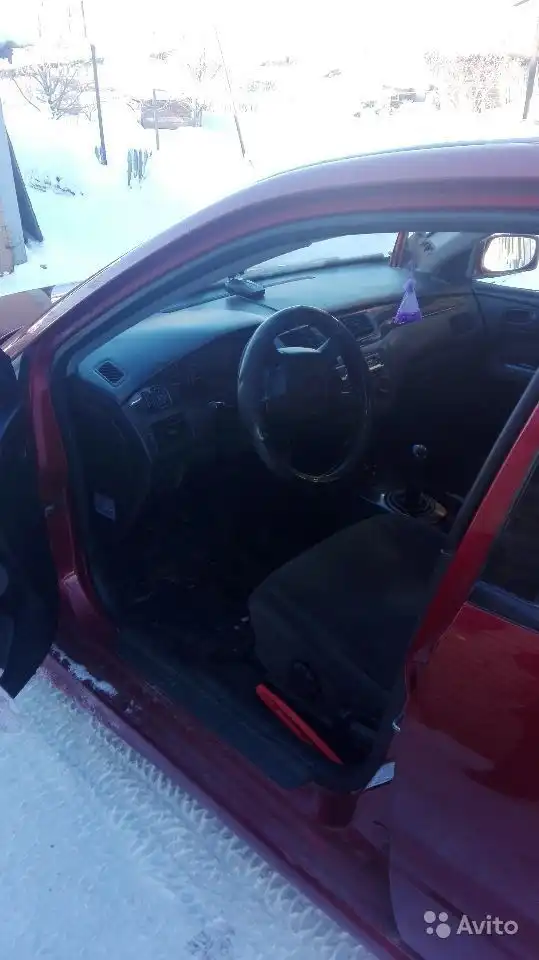 Фото автомобиля MITSUBISHI LANCER, 2004 — госномер О375ЕМ48. Цвет: Красный