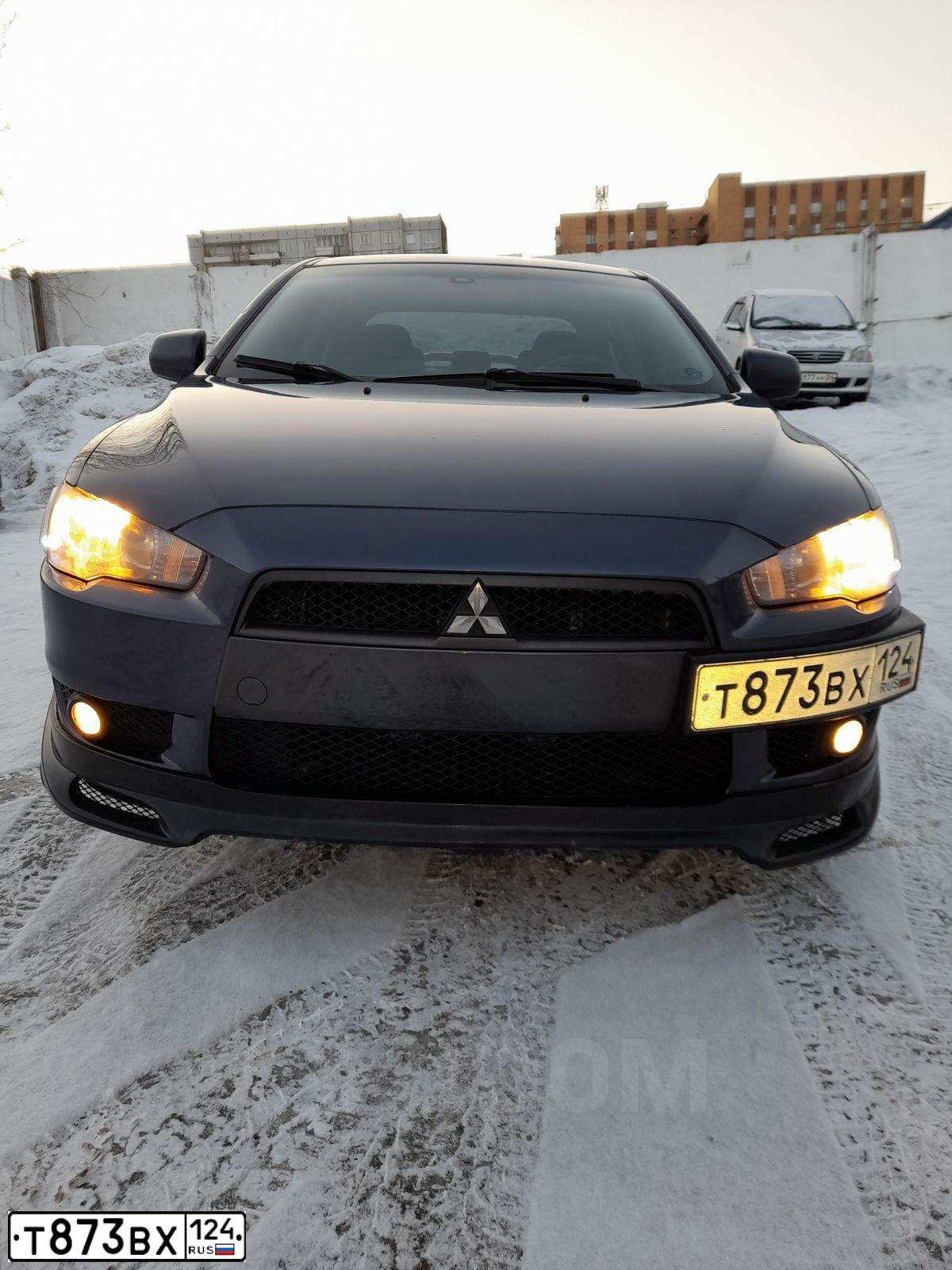 Фото автомобиля MITSUBISHI LANCER, 2008 — госномер В371ЕО323. Цвет: синий